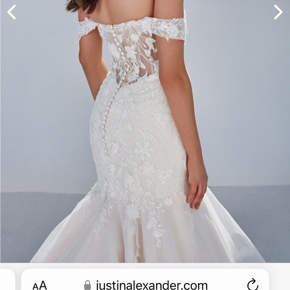 Hello this is a Justin Alexander size 16-18 - Picture 5 of 7